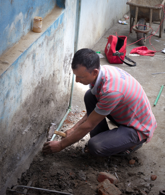 Installing Pipes in Balambu Lower Secondary School